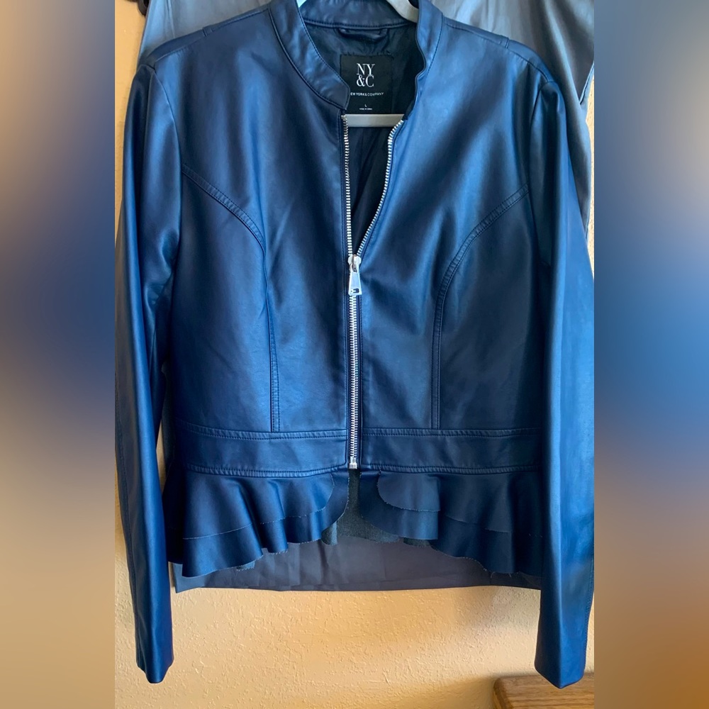 Faux leather zip up jacket. New never worn without tags.